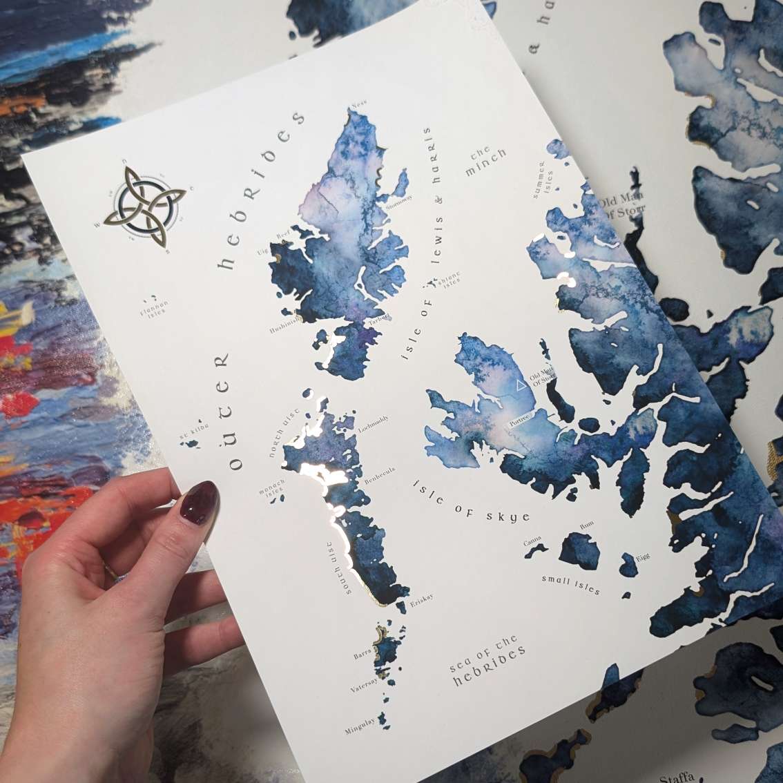 Close-up of gold highlights on watercolour map of Skye and the Outer Hebrides