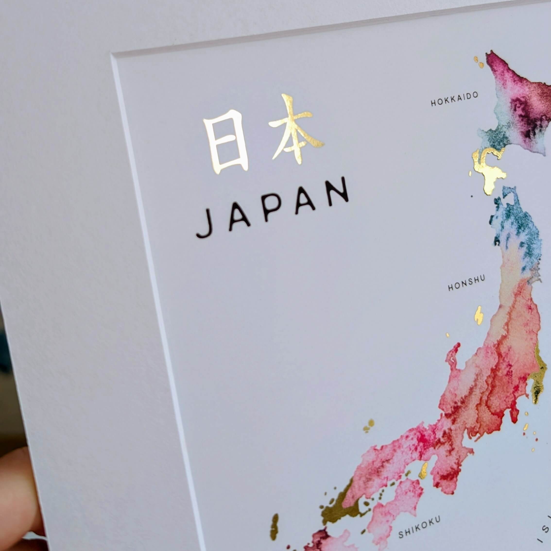 Map of Japan with watercolor design and text on a white background