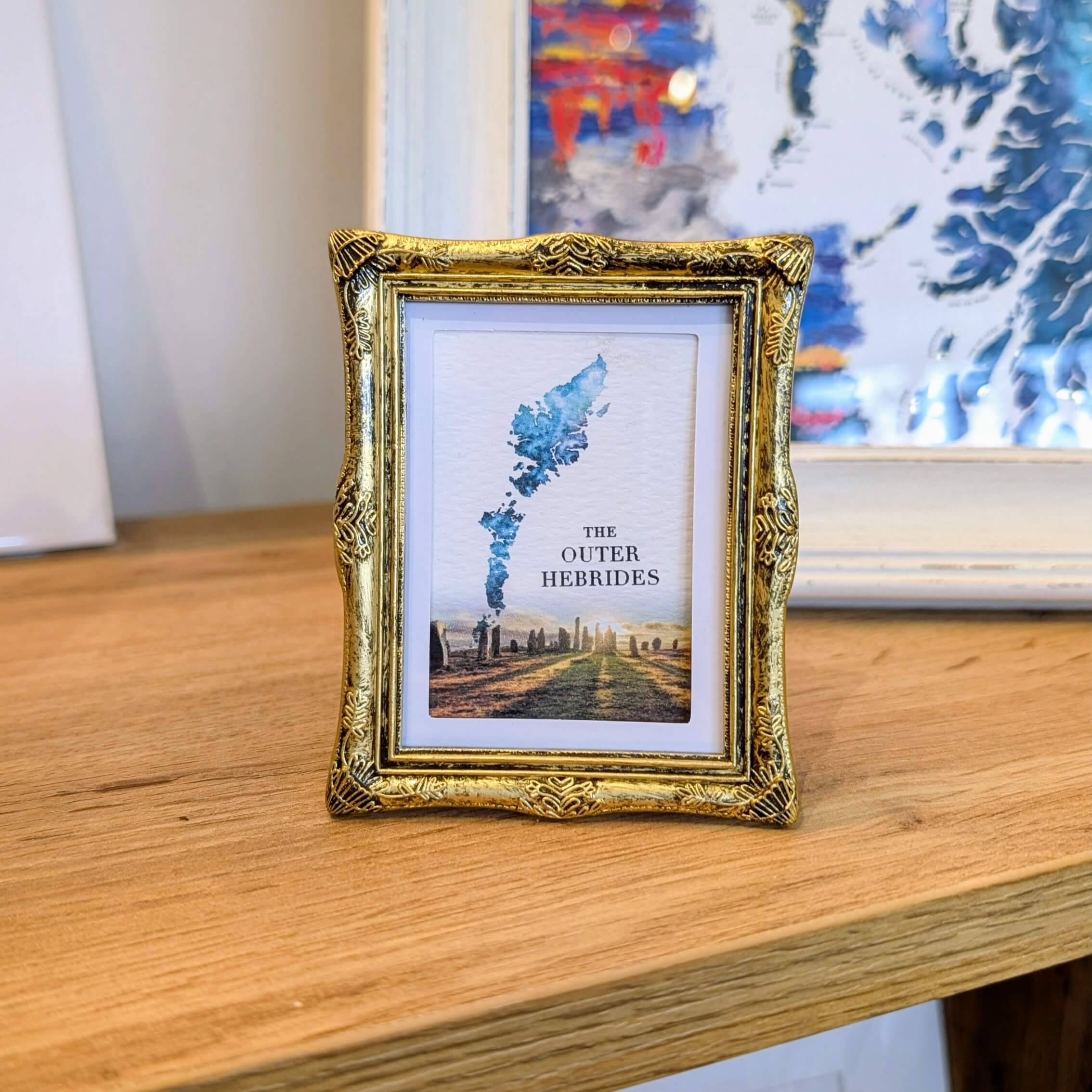 gold frame magnet of the outer hebrides with the callanish stones sunset