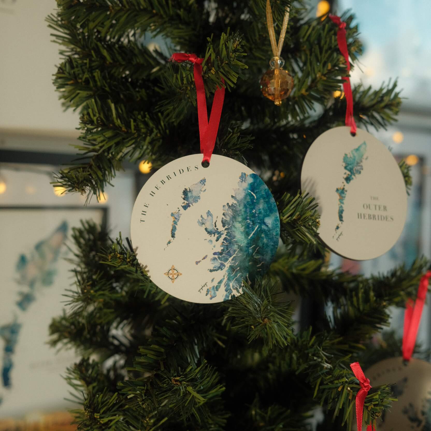 christmas bauble watercolour map of Scottish Hebrides by artist Eilidh Jamieson